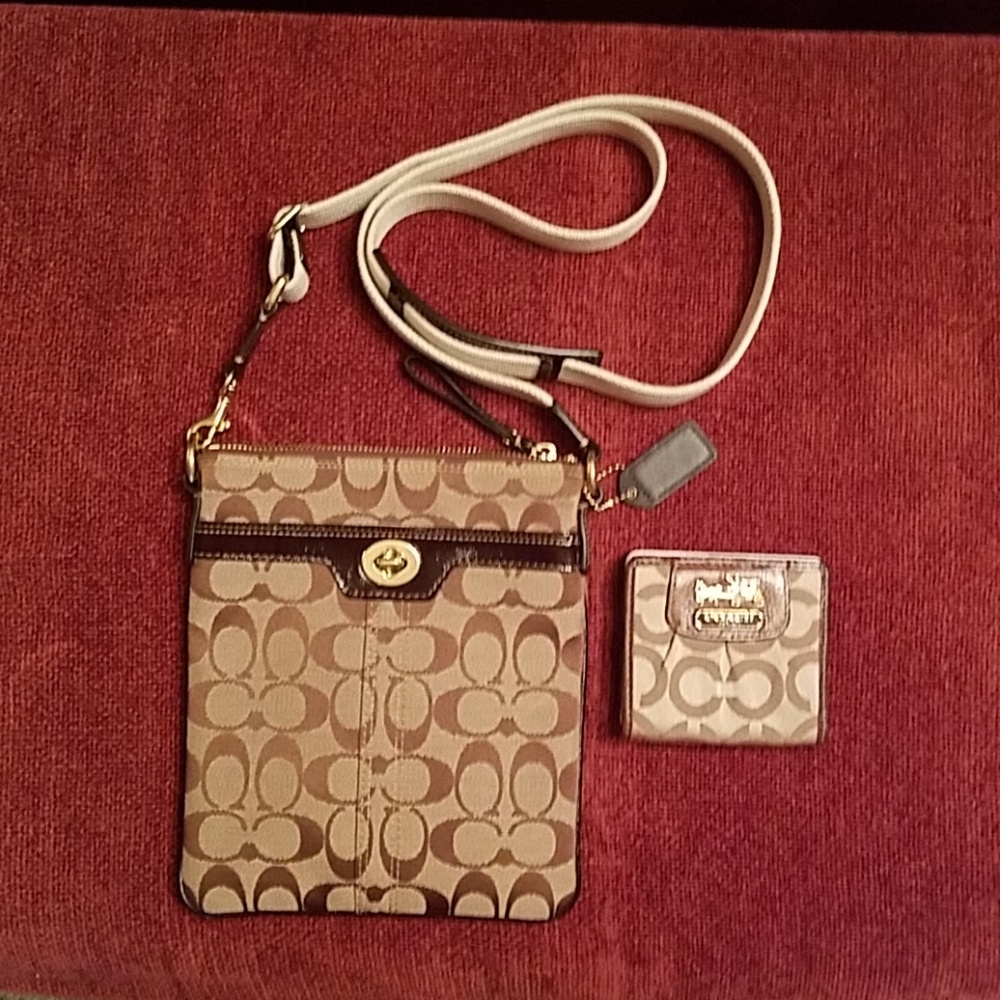 coach signature crossbody with small wallet.